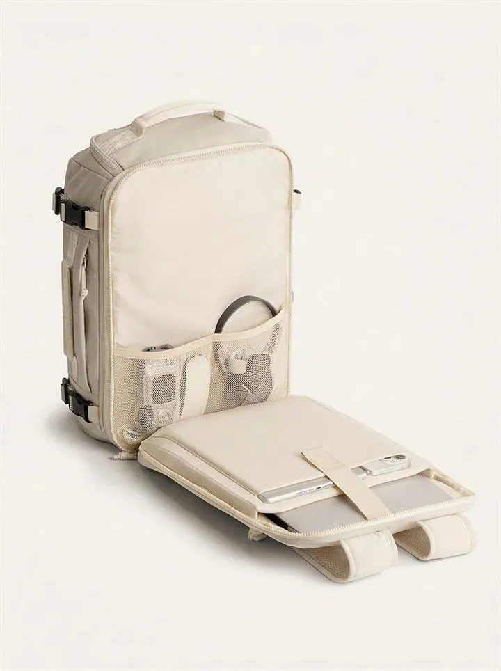 Laptop compartment opened flat with mesh organiser pockets